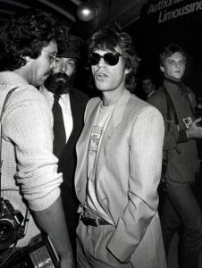 Mick Jagger with photographer David McGough.jpg
